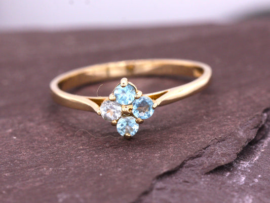 9ct Yellow Gold 4 Stone Blue Topaz Flower Ring Size O British Made