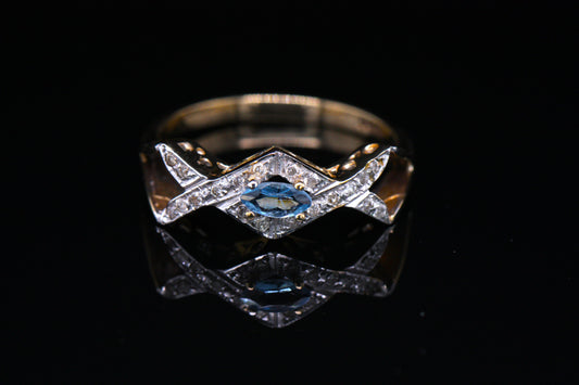 9ct Yellow Gold Blue Topaz & Diamond Cross Over Ring Size O British Made