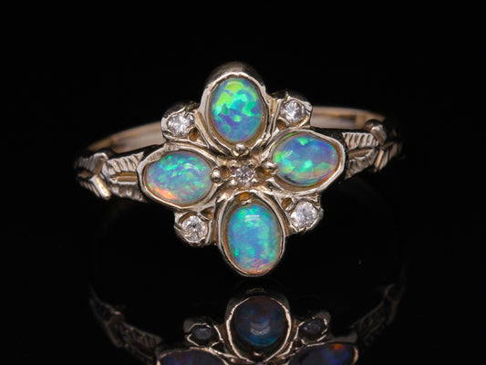 BJC® 9ct Yellow Gold Oval Cut Opal & Diamond Size N Cluster Ring R189