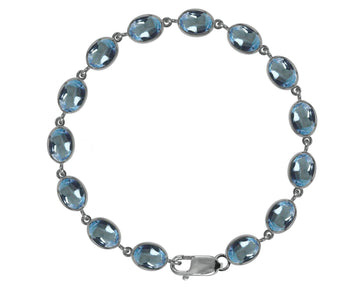 BJC® 9ct White Gold Natural Blue Topaz 21.00ct Oval Gemstone Tennis Bracelet