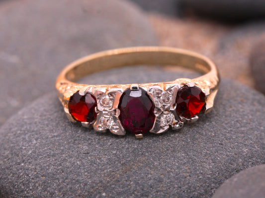 BJC® 9ct Yellow Gold Almandine Garnet & Diamond Oval Gypsy Kiss Ring Size M R127