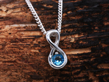 Sterling Silver Blue Topaz Infinity Love Pendant & Silver Necklace British Made