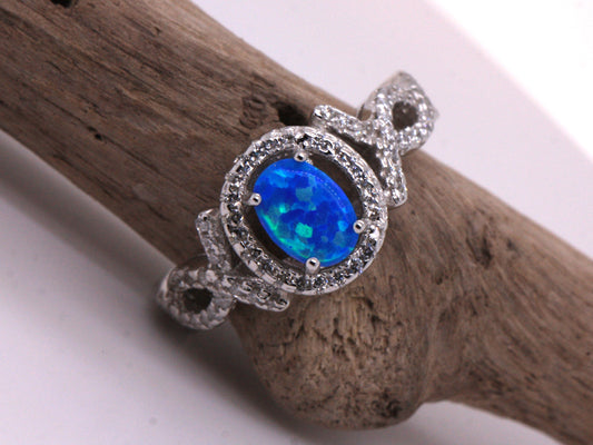 BJC® Sterling Silver Fiery Blue Opal & Cubic Zirconia Oval Solitaire CZ Ring Size J