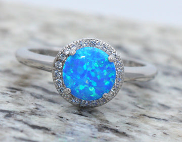BJC® Sterling Silver Fiery Blue Opal & Cubic Zirconia Round CZ Ring Size L