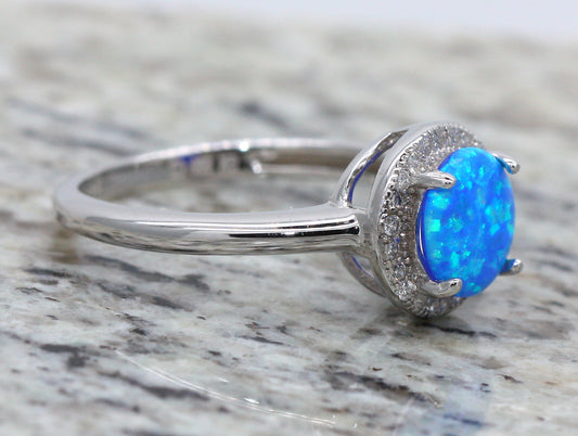 BJC® Sterling Silver Fiery Blue Opal & Cubic Zirconia Round CZ Ring Size L