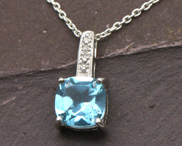 BJC® Sterling Silver Blue Topaz & Diamond Cushion Drop Pendant & Silver Necklace SP2