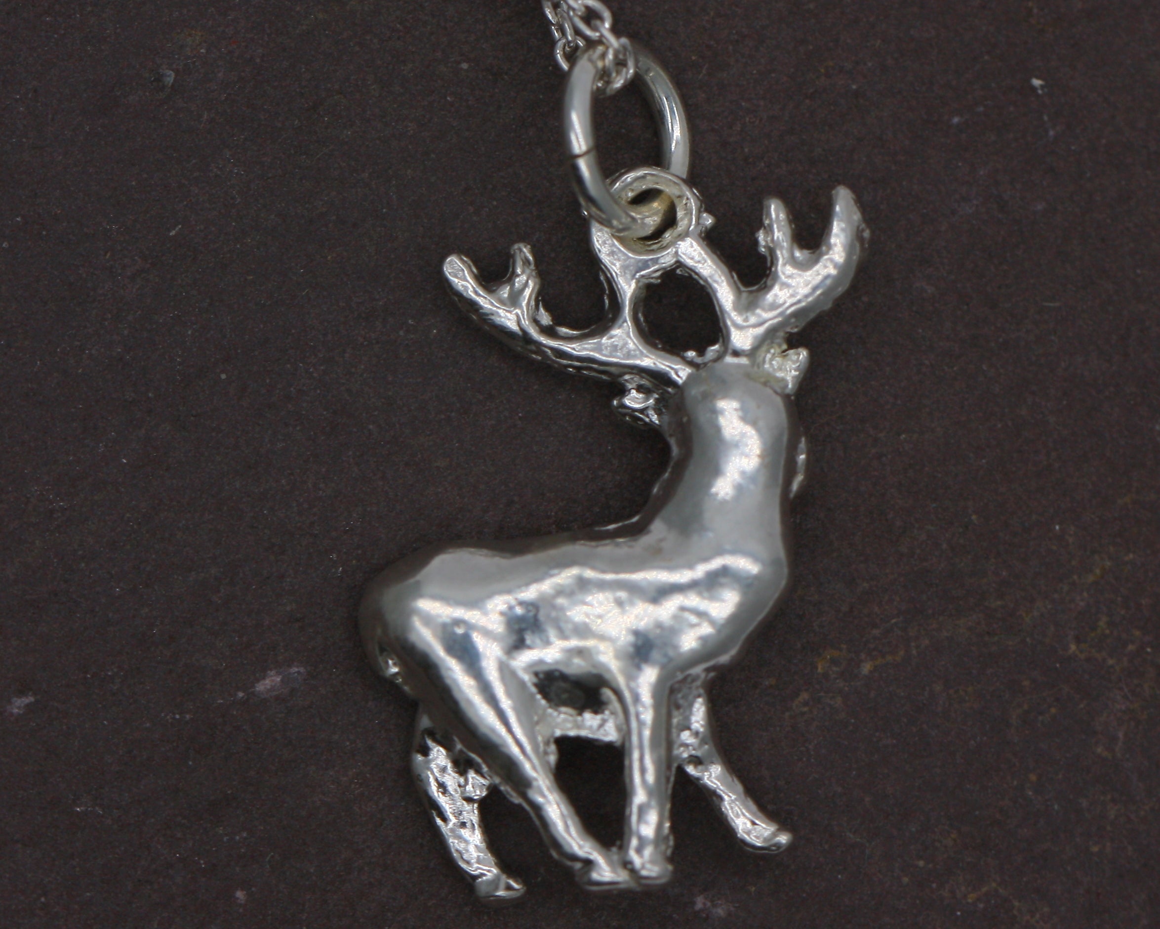 Sterling silver deer on sale charm