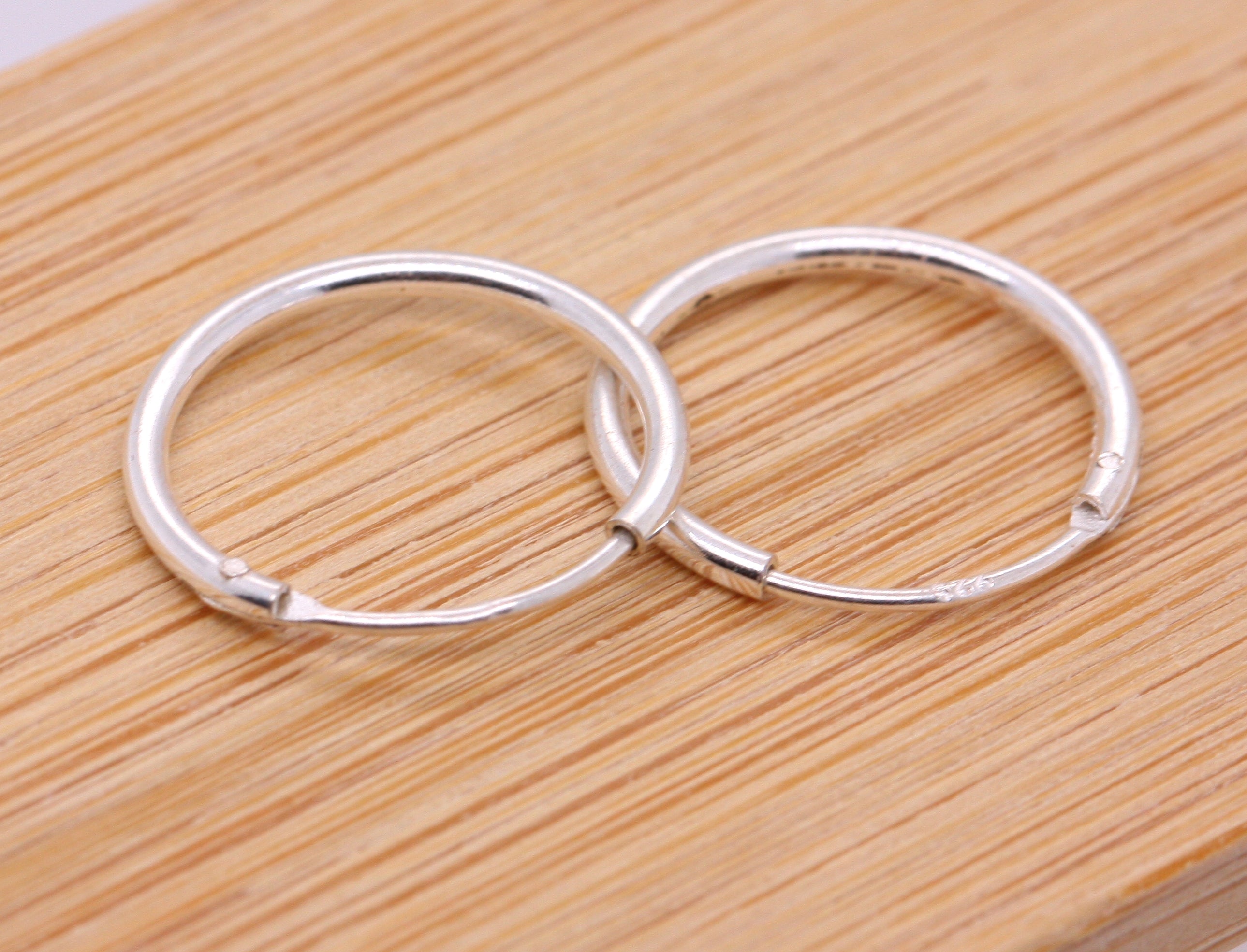 Sterling silver hollow hoop on sale earrings